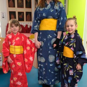 students and teacher in kimonos