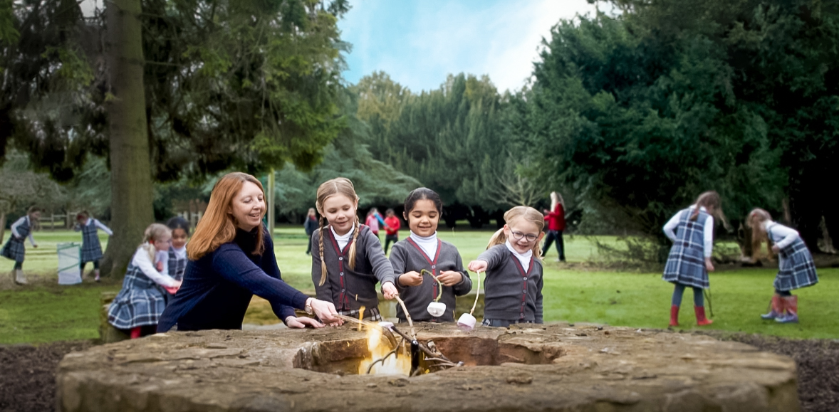 pupils toasting marshmallows